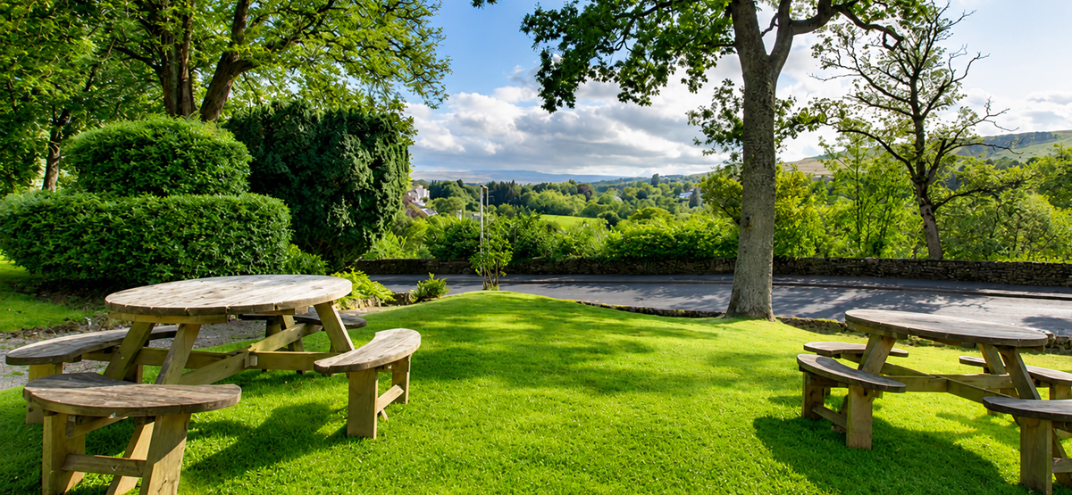 Gardens and picnic area at Lowbyer Manor Country House overlooking Alston and the North Pennines